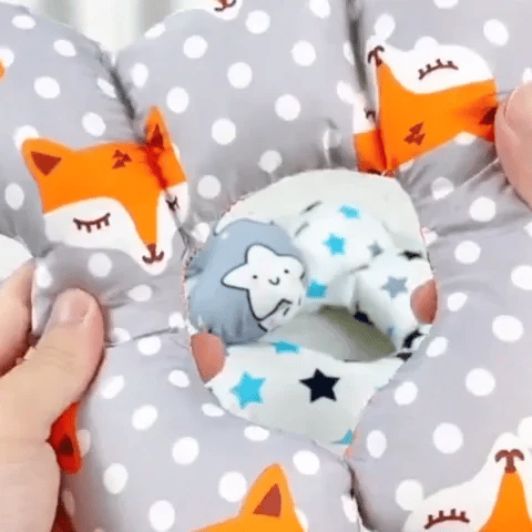 Oreiller tête bébé